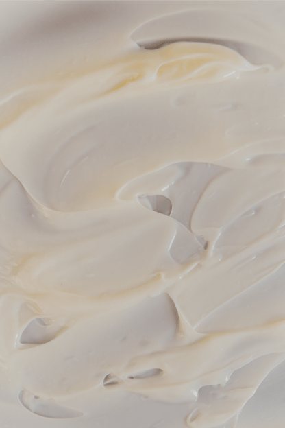 Close-up of smooth, white cream demonstrating texture