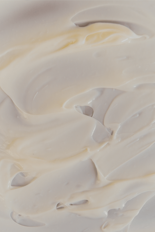 Close-up of smooth, white cream demonstrating texture