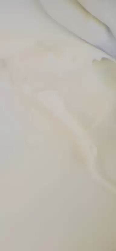 Cream being smoothed out with a tool.